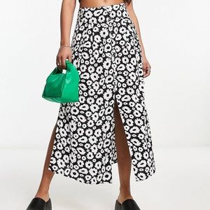 ASOS DESIGN button through midi skirt with split in mono daisy print